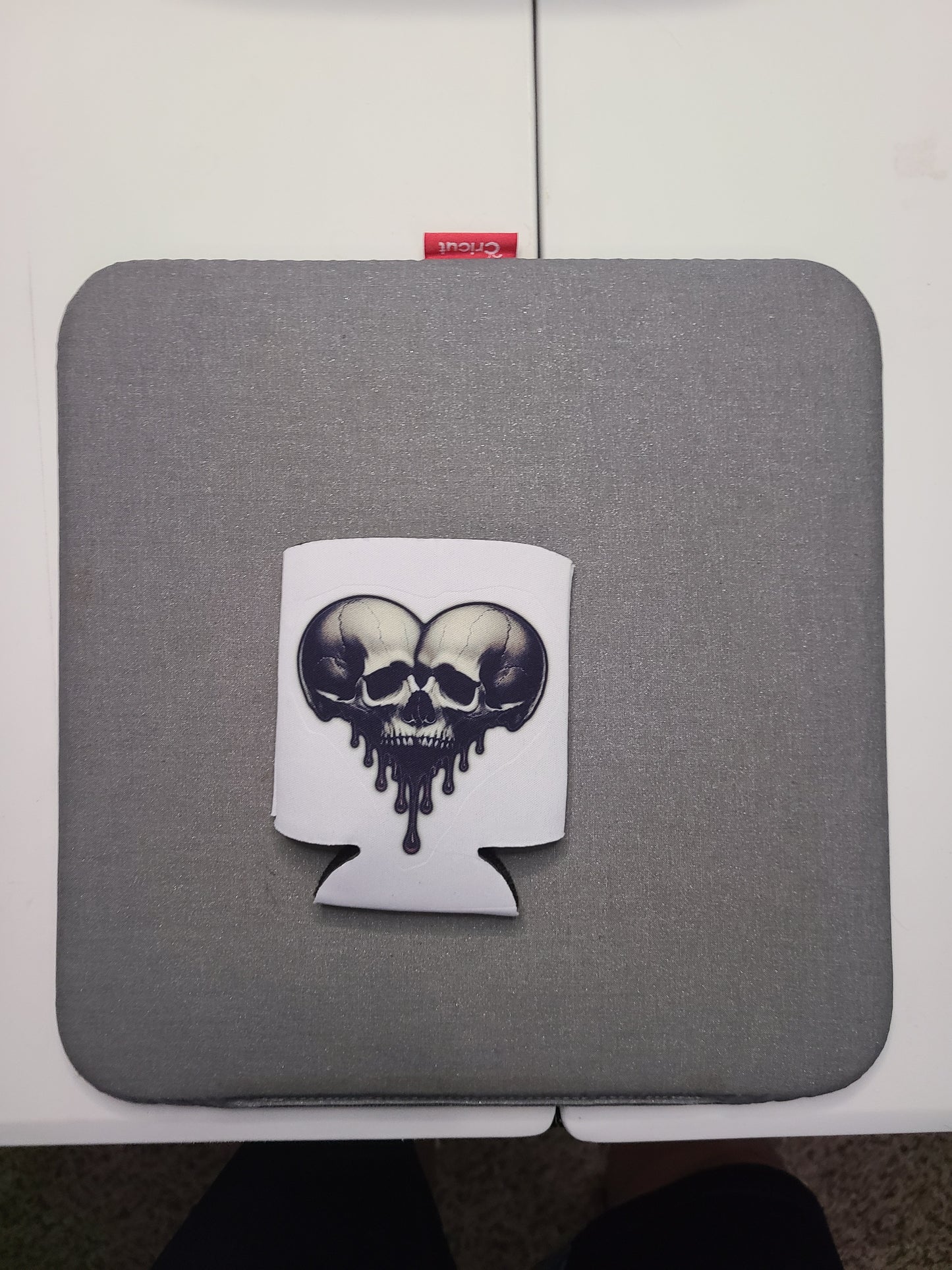 Melting Skulls Koozie